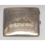 An Iraqi silver curved rounded rectangular cigarette case, engraved with a dhow and a Middle Eastern