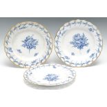 A set of three Royal Copenhagen plates, painted in under glaze blue with flowers, pierced rim,