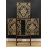 A George/William IV mahogany three-banner extending firescreen, fluted frame applied with draught-