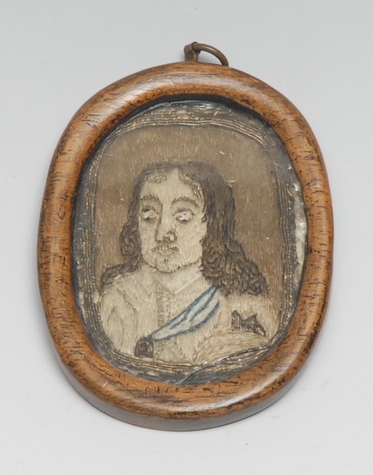 A 17th century needlework portrait miniature, embroidered in silk with Charles II, bust length, 4.