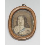 A 17th century needlework portrait miniature, embroidered in silk with Charles II, bust length, 4.