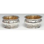 A pair of Italian silver fluted oval sweetmeat dishes, gilt interiors, 10.5cm wide, marked