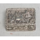 A Chinese silver rectangular vinaigrette, in relief with young boys in landscapes and riding a