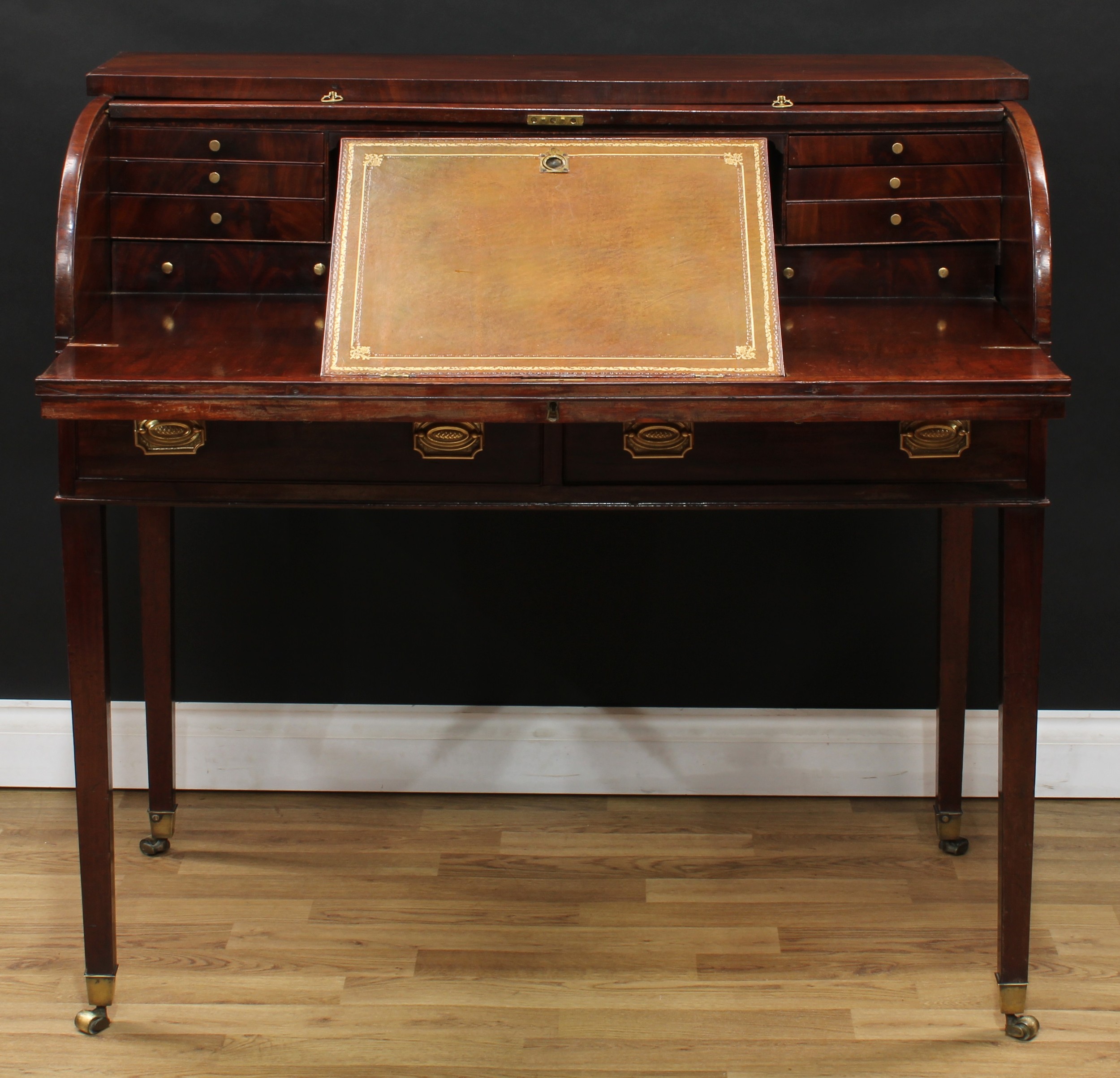 A George III mahogany tambour-fronted writing desk, oversailing top above a retractable front - Image 2 of 9
