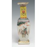 A Chinese square vase, painted in polychrome with figures of the court, within manganese borders,