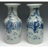 A large pair of Chinese porcelain baluster vases, painted with a Court official and his advisers