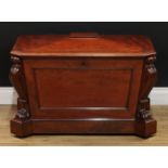 A Post-Regency mahogany cellarette, hinged sarcophagus cover enclosing a zinc liner, panel sides,