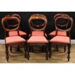 A set of six Victorian mahogany balloon back dining chairs, drop-in seats, turned forelegs,