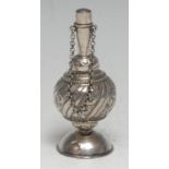 A 19th century French silver globular scent bottle or flask, for the Moorish market, chased with
