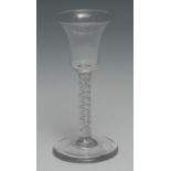 A George III air twist wine glass, bucket shaped bowl, double-helix stem, circular foot, 15cm