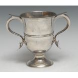 An early George III silver bell shaped loving cup, centre girdle, scroll-capped handles with heart