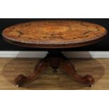 A Victorian walnut and marquetry centre table, circular top with foliate carved edge, profusely