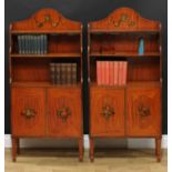 A pair of Sheraton Revival rosewood crossbanded painted satinwood waterfall bookcases, of small