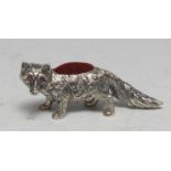 A silver novelty pin cushion, as a fox, 6cm long, marked sterling