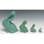 A set of four graduated Bourne Denby Danesby Ware Antique Green matt glazed Marmaduke rabbits,