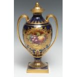 A Lynton porcelain two-handled pedestal ovoid vase, painted by T. S. Abbotts, signed, with a still