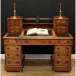 A Victorian walnut twin pedestal writing desk, the superstructure with spindle gallery flanked by