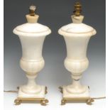 A pair of Neo-Classical design half-fluted campana table lamps, square bases, dolphin feet, 46cm