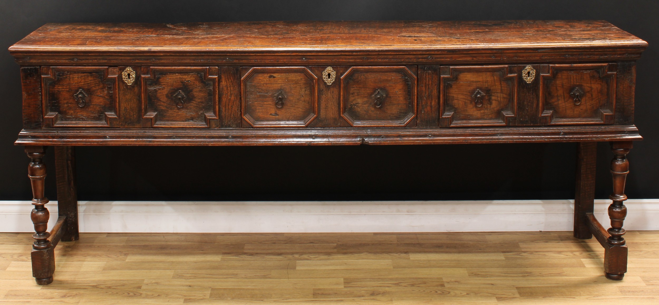 A Charles II design oak block front low dresser, oversailing plank top with moulded edge above three - Image 2 of 6