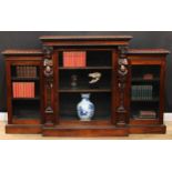 A Victorian rosewood low library bookcase, rectangular top above a rectangular glazed door flanked