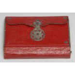 A 19th century silver coloured metal mounted red morocco aide memoir, enclosing a watered-silk lined