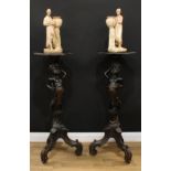 A pair of Venetian softwood blackamoor torcheres, each carved and painted as a scantily clad