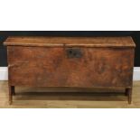 An 18th century elm six-plank chest, hinged cover, 48cm high, 98.5cm wide, 28.5cm deep