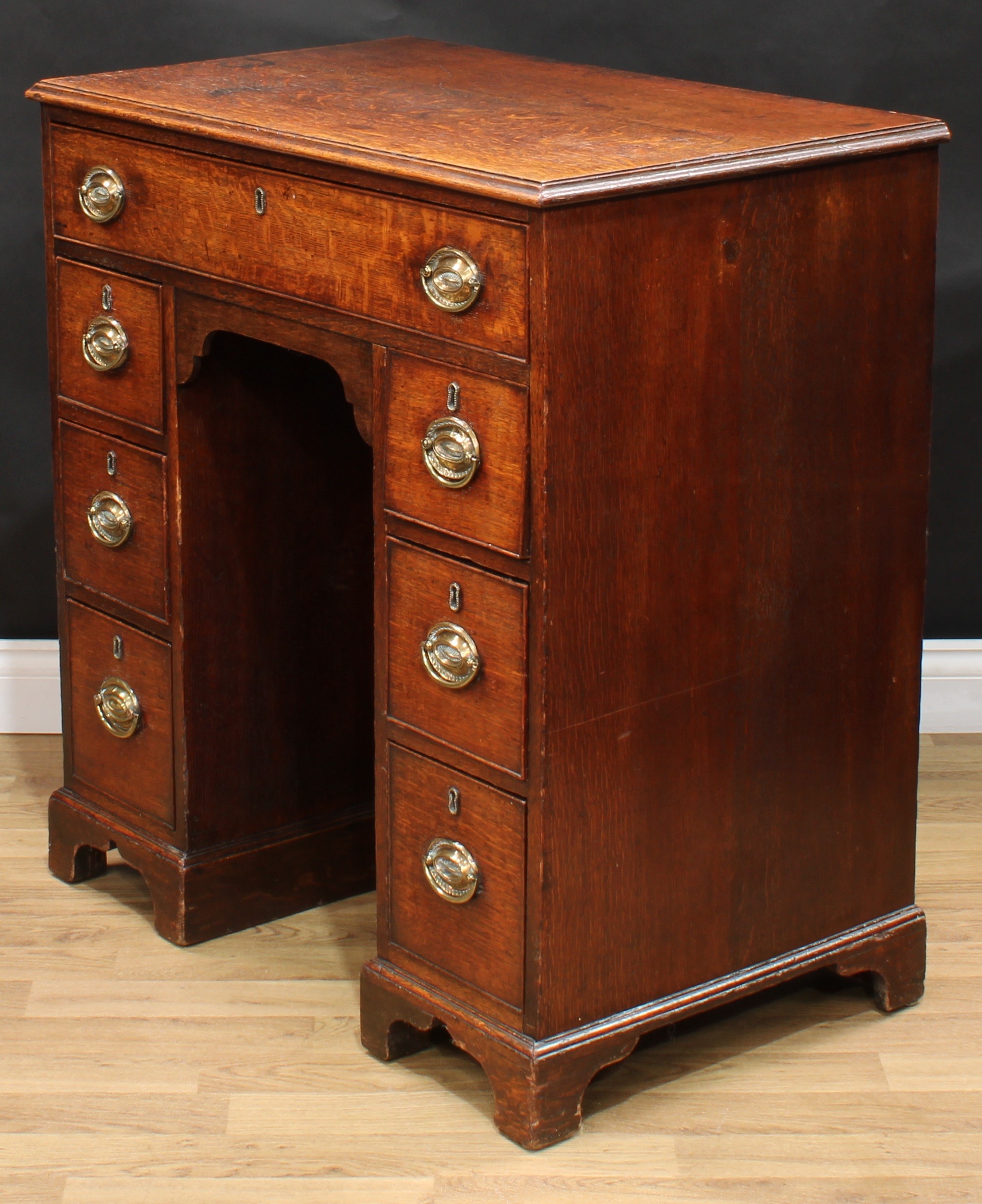 A George III oak kneehole desk, rectangular top with moulded edge above a long cockbeaded frieze - Image 5 of 6