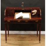 A George III mahogany tambour-fronted writing desk, oversailing top above a retractable front