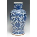 A Chinese porcelain inverted baluster vase, painted in underglaze blue with chrysanthemums, lotus