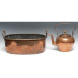 A 19th century copper oval fish kettle, raised carrying handles, 50cm wide, c.1850; a 19th century