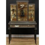 A 19th century brass mounted ebonised bijouterie vitrine cabinet, the stepped superstructure with