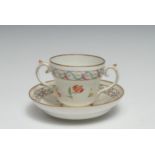 A Chelsea Gold Anchor ogee-shaped chocolate or caudle cup and saucer, painted with country