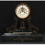 A 19th century French black marble drum head mantel clock, 11.5cm enamel dial inscribed Soleil D'