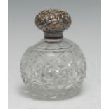 A late Victorian silver mounted hobnail-cut glass scent bottle, the screw-fitting cover embossed