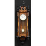 A 19th century walnut and ebonised Vienna wall clock, 12.5cm enamel dial inscribed with Roman