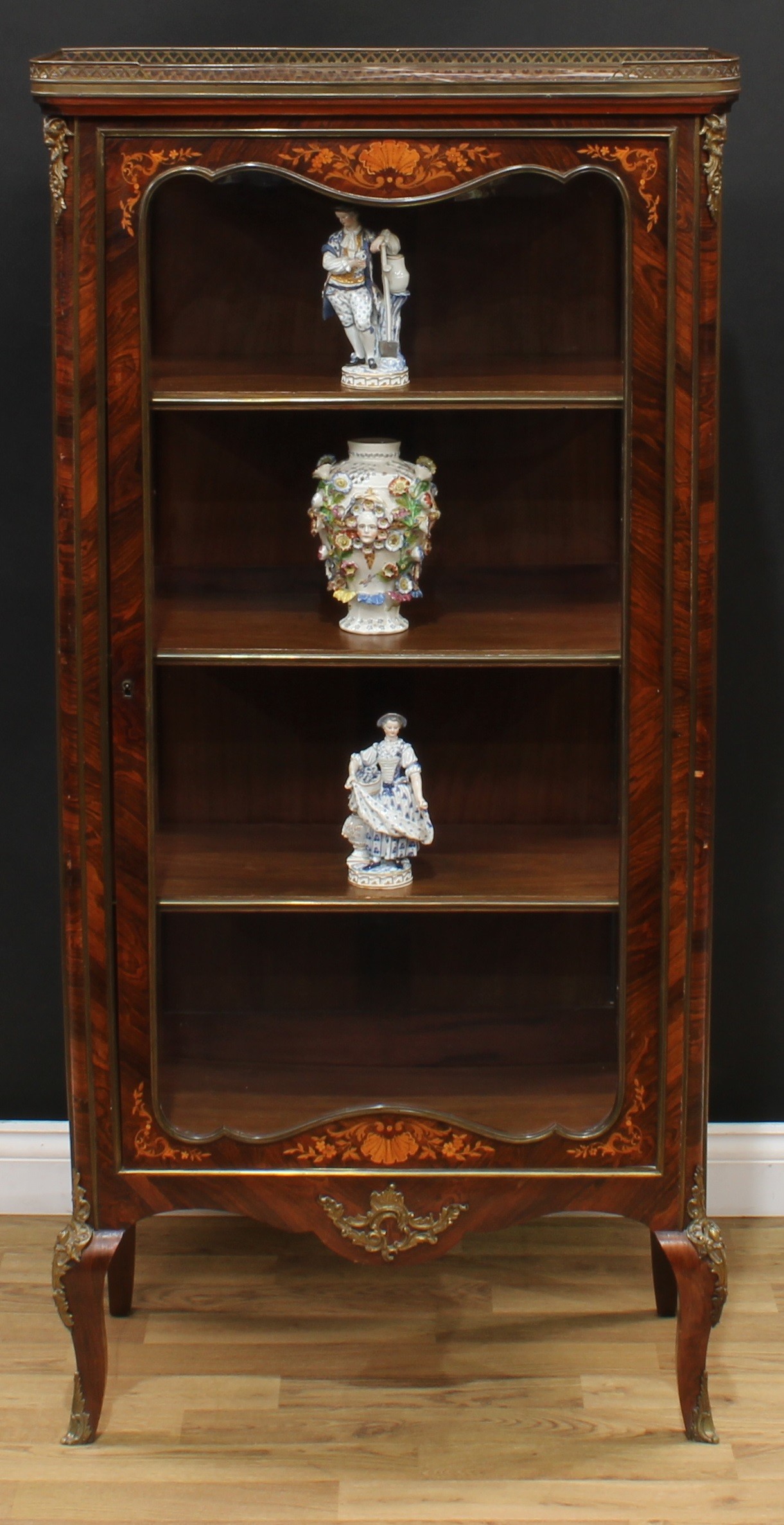 A Louis XV Revival gilt metal mounted rosewood and marquetry vitrine, rouge marble top with