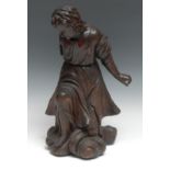 A North European oak carving, of a male figure, bowing in adoration, 37cm high, 18th/19th century