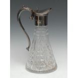 An Elizabeth II silver mounted claret jug, hinged cover with Onslow thumbpiece, acanthus-capped