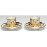 A pair of Lynton porcelain cabinet coffee cups and stands, decorated in polychrome with butterflies,