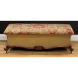 A Victorian mahogany ottoman box stool, stuffed-over woolwork upholstery, scroll legs, ceramic