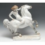 A Herand Hungary model, of a female nude riding a horse bareback, 45cm high, printed marks