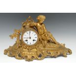 A 19th century French ormolu mantel clock, 8cm enamel dial inscribed with Roman numerals, twin