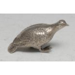 An Elizabeth II cast silver model, of a game bird, 8cm long, William Comyns & Sons, London 1975