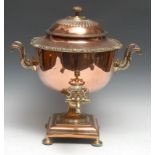 A post-Regency copper and brass pedestal samovar, domed fluted cover, scroll handles, square base,