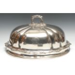 A 19th century fluted meat dome, crested, branch handle, cast leafy scroll quarter girdle, 50cm