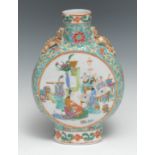 A Chinese moon flask, painted in polychrome enamels with court musicians, to verso with exotic birds