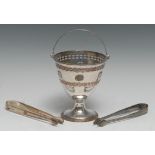 A George III Old Sheffield Plate swing-handled urnular pedestal sugar basket, pierced in the Neo-