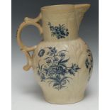 A large Worcester Natural Sprays pattern Cabbage Leaf Mask jug, moulded with overlapping leaves,