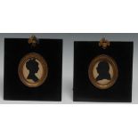 English School (19th/early 20th century), a pair of cut paper silhouettes, of a gentleman and